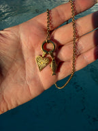 Long heart evil eye charm