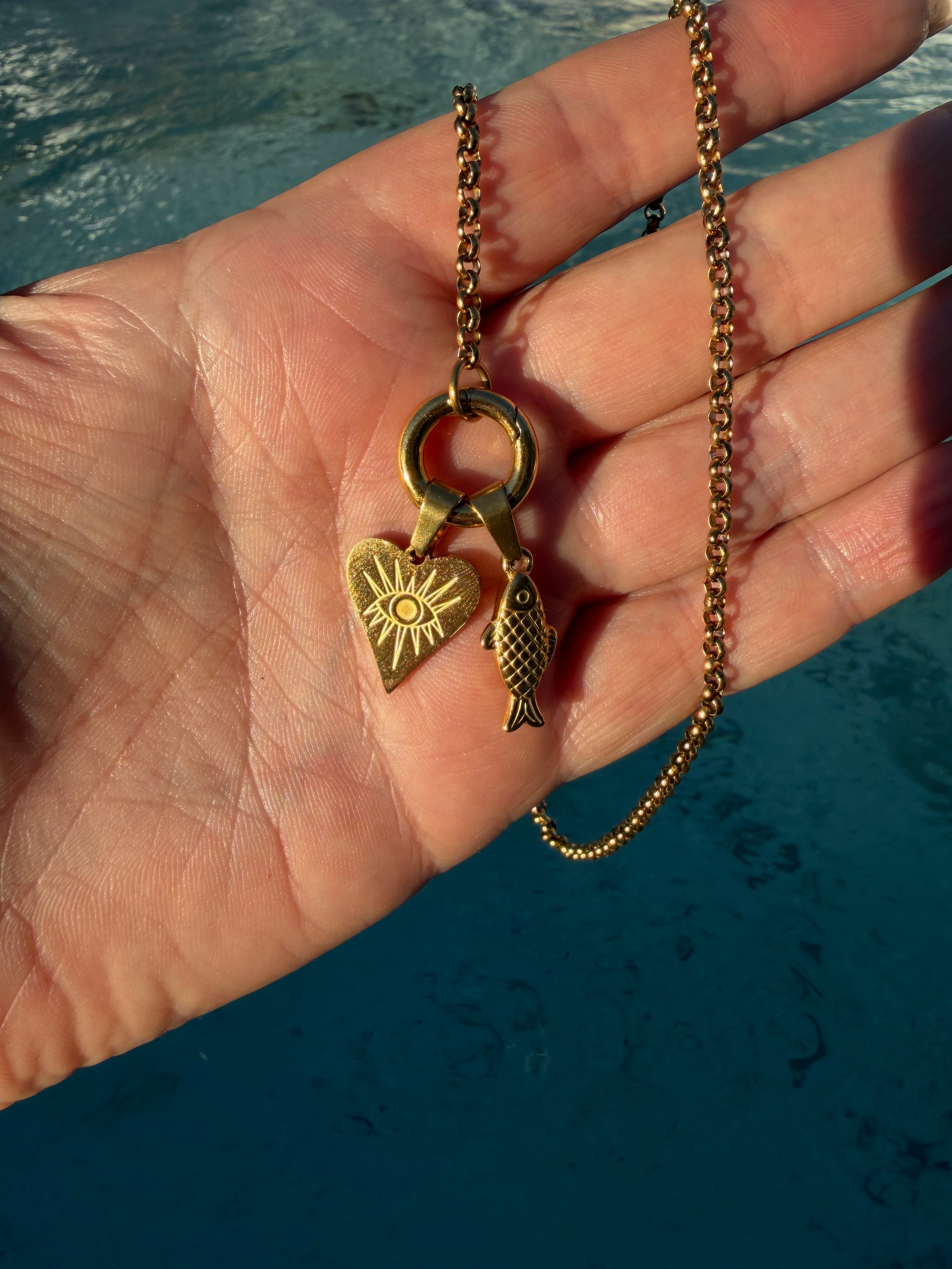 Long heart evil eye charm