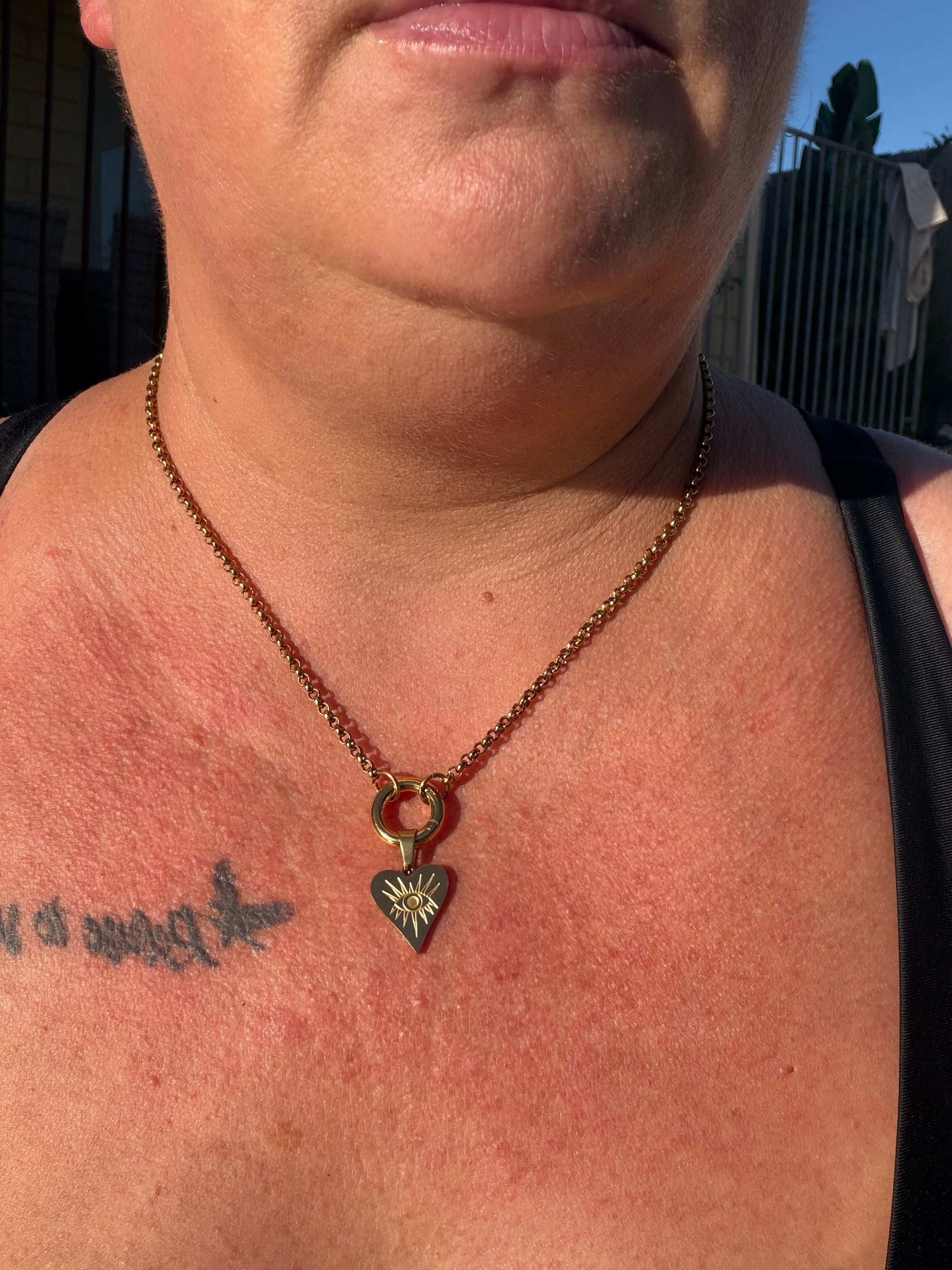 Long heart evil eye charm