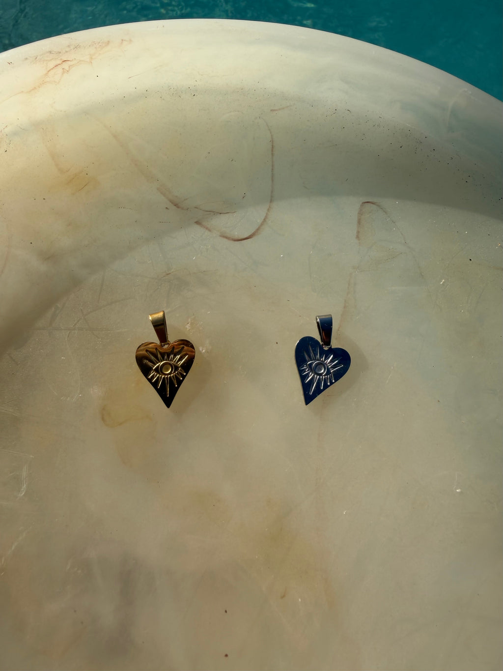 Long heart evil eye charm